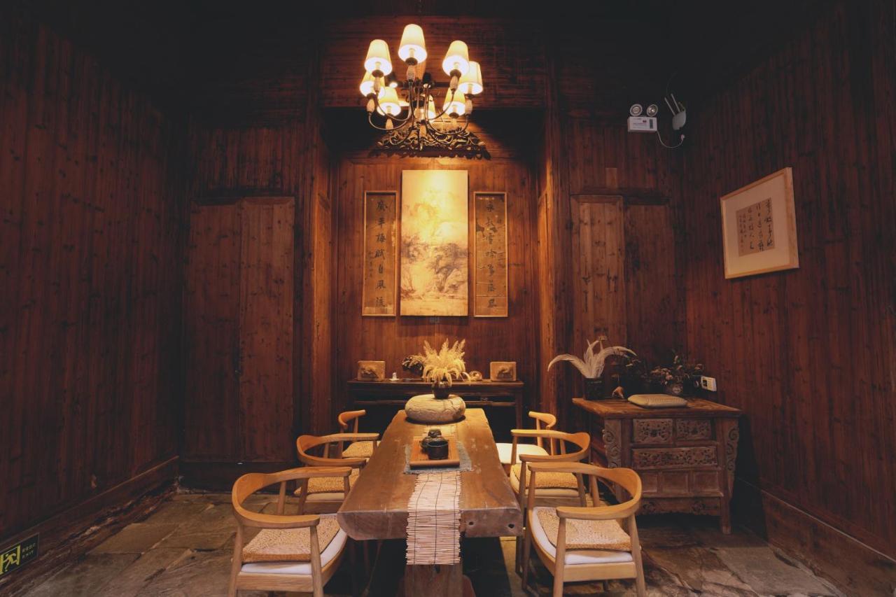 WuYuan QiYe YanXiang Guesthouse Bagian luar foto