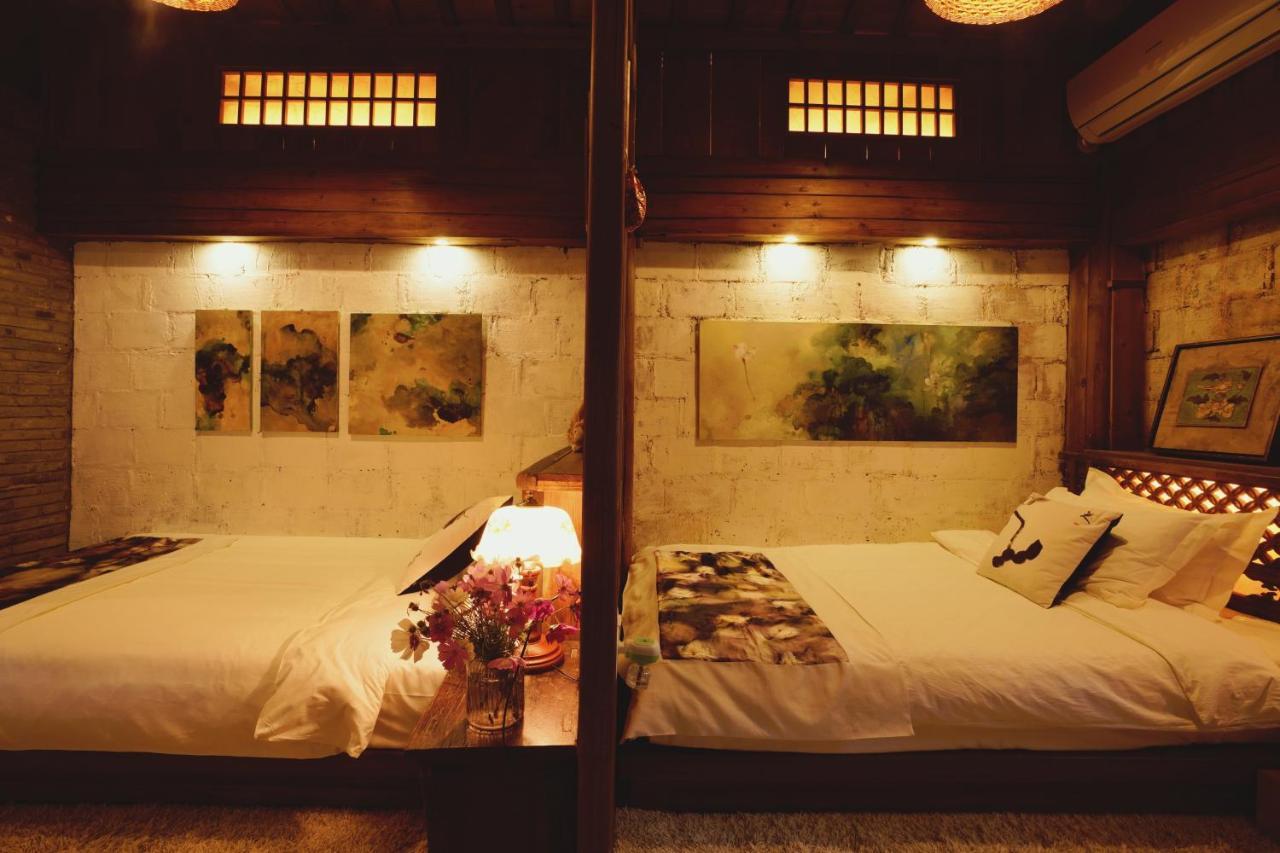 WuYuan QiYe YanXiang Guesthouse Bagian luar foto