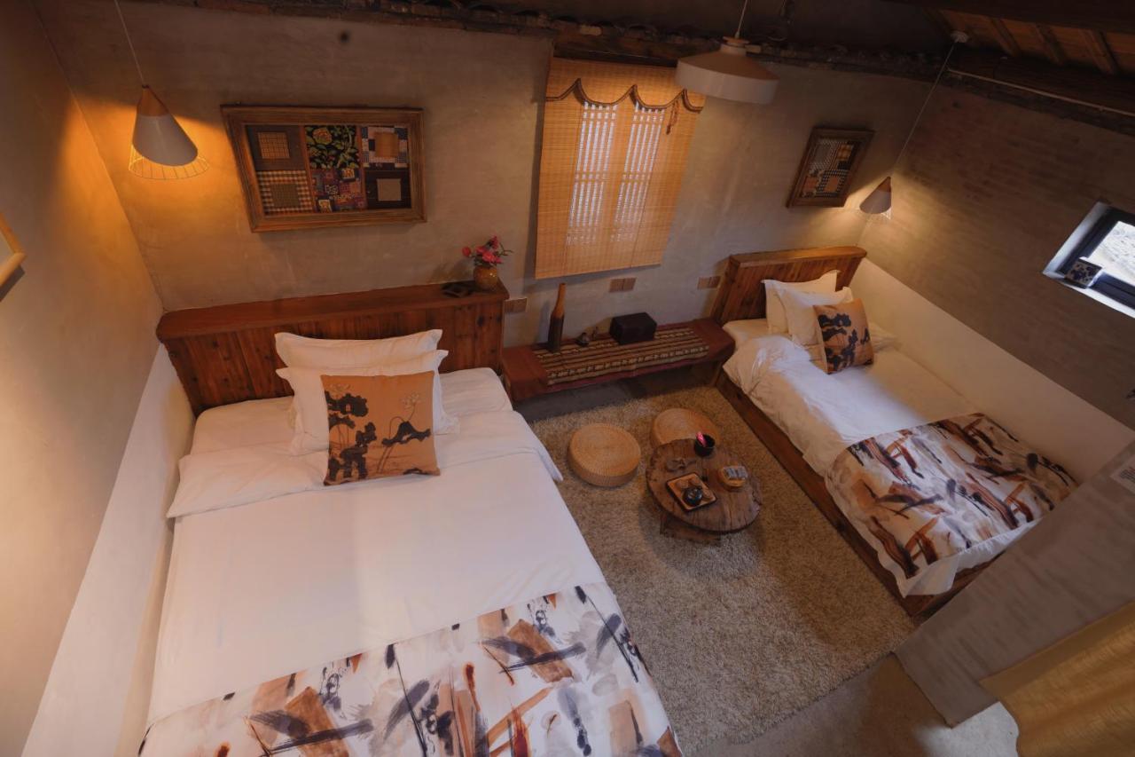 WuYuan QiYe YanXiang Guesthouse Bagian luar foto