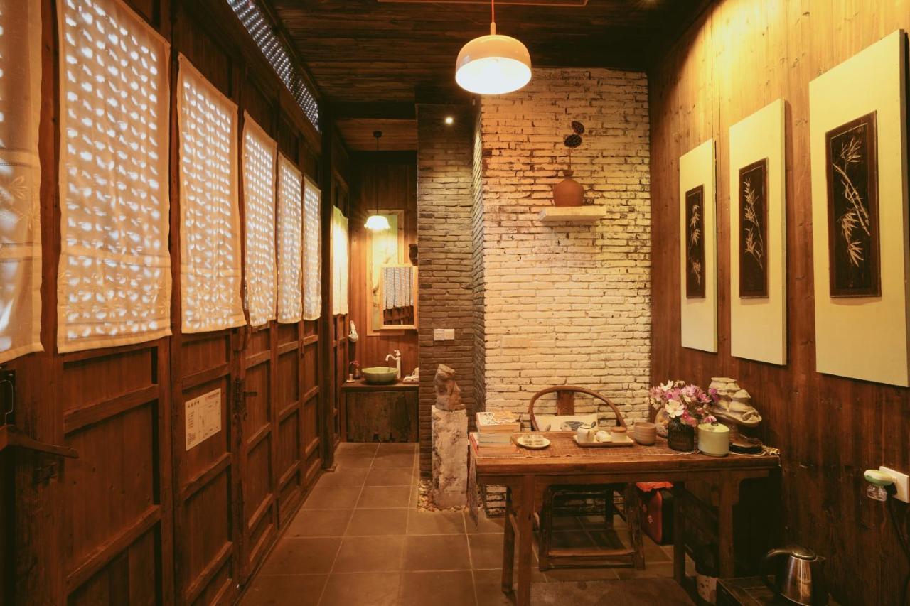 WuYuan QiYe YanXiang Guesthouse Bagian luar foto