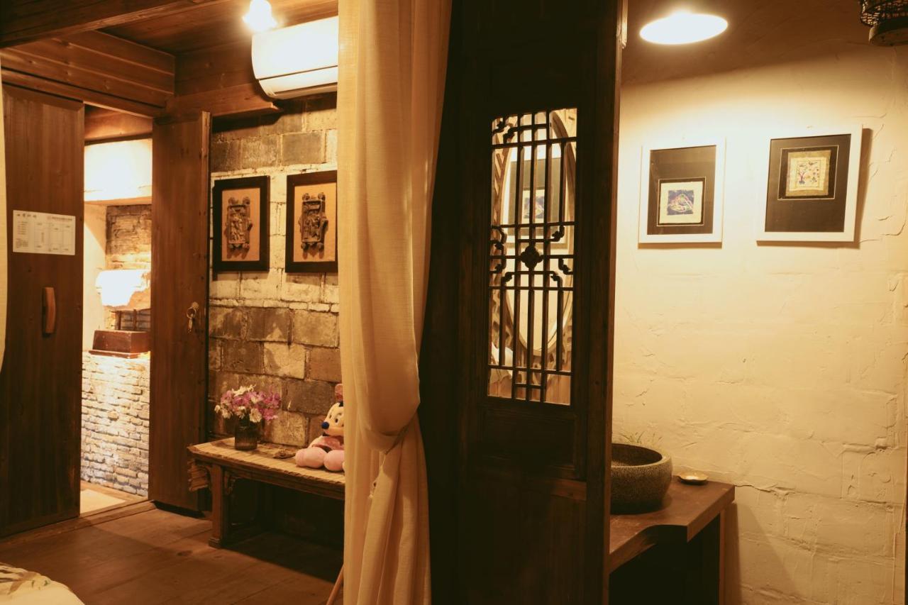 WuYuan QiYe YanXiang Guesthouse Bagian luar foto