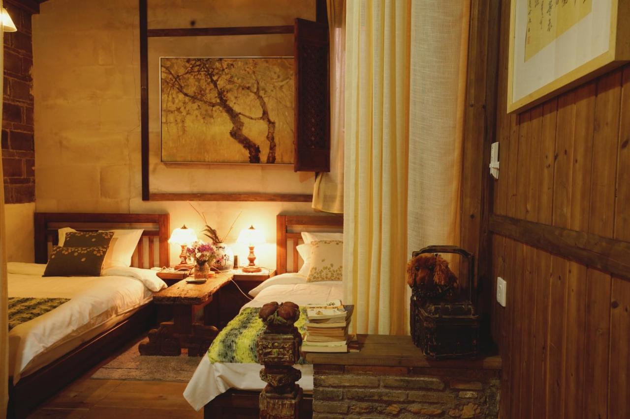 WuYuan QiYe YanXiang Guesthouse Bagian luar foto