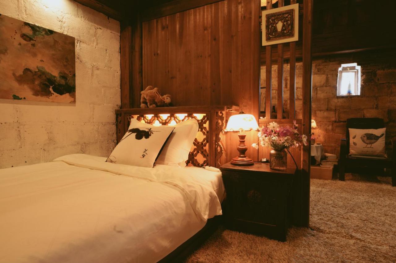 WuYuan QiYe YanXiang Guesthouse Bagian luar foto