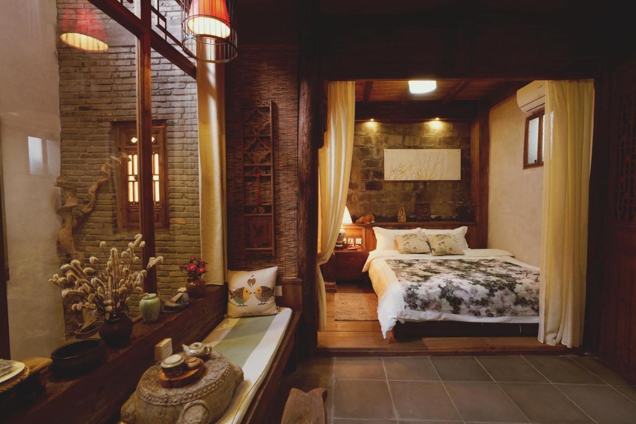WuYuan QiYe YanXiang Guesthouse Bagian luar foto