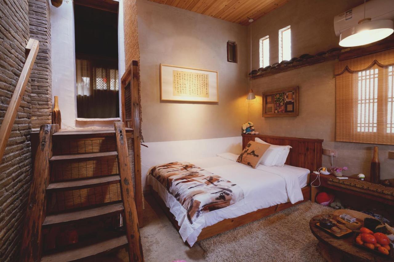 WuYuan QiYe YanXiang Guesthouse Bagian luar foto
