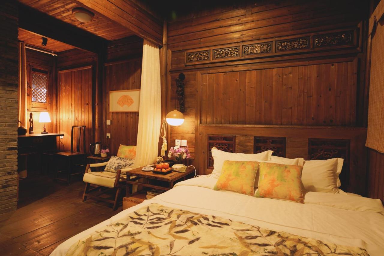 WuYuan QiYe YanXiang Guesthouse Bagian luar foto