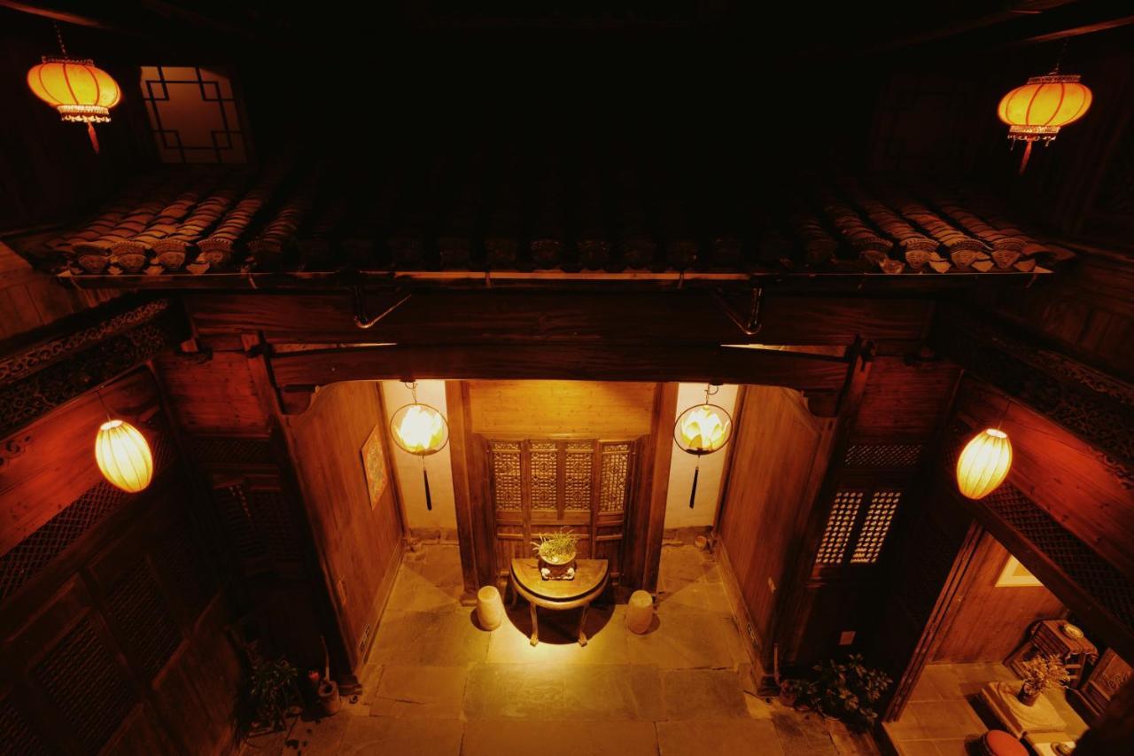 WuYuan QiYe YanXiang Guesthouse Bagian luar foto
