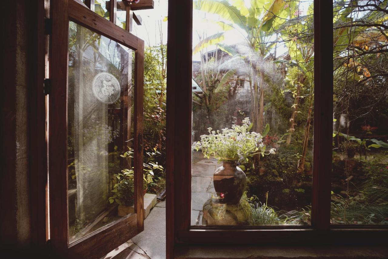WuYuan QiYe YanXiang Guesthouse Bagian luar foto
