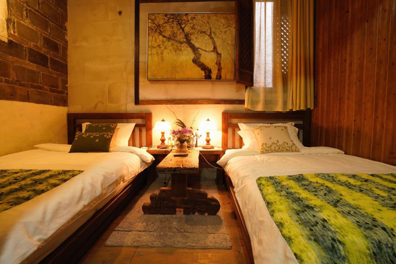 WuYuan QiYe YanXiang Guesthouse Bagian luar foto