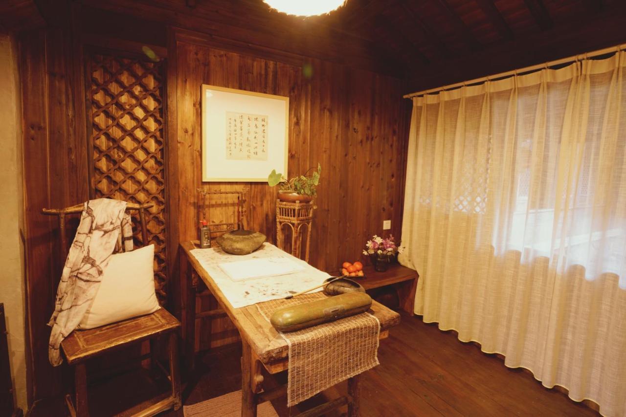 WuYuan QiYe YanXiang Guesthouse Bagian luar foto