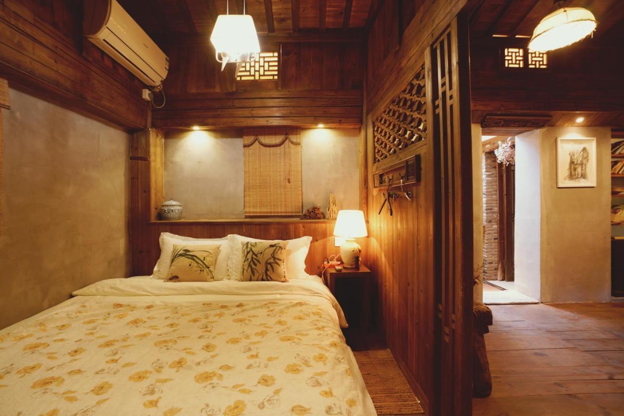 WuYuan QiYe YanXiang Guesthouse Bagian luar foto