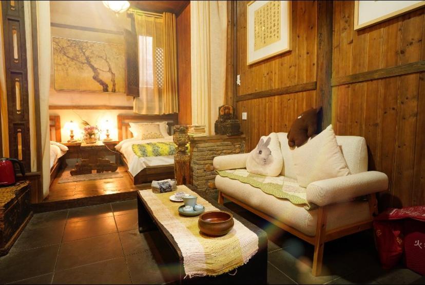 WuYuan QiYe YanXiang Guesthouse Bagian luar foto