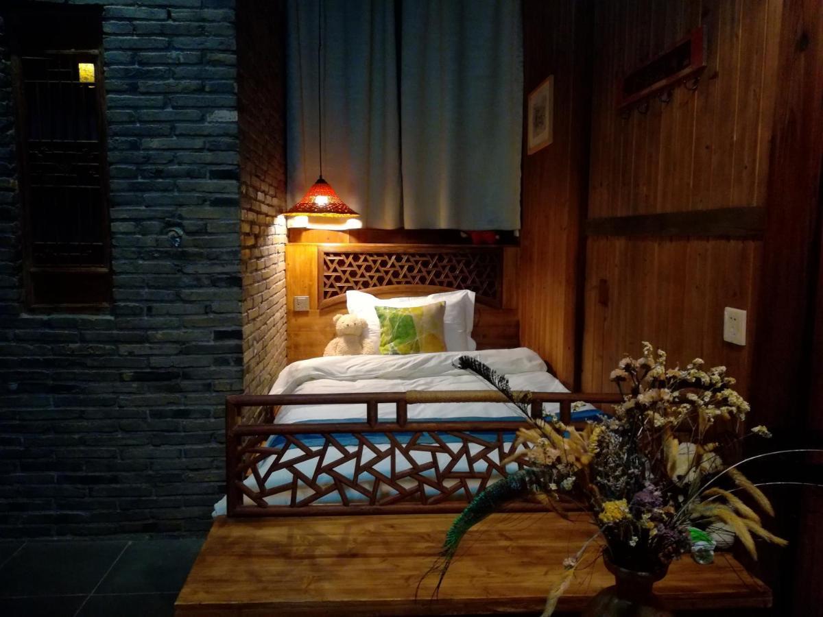WuYuan QiYe YanXiang Guesthouse Bagian luar foto
