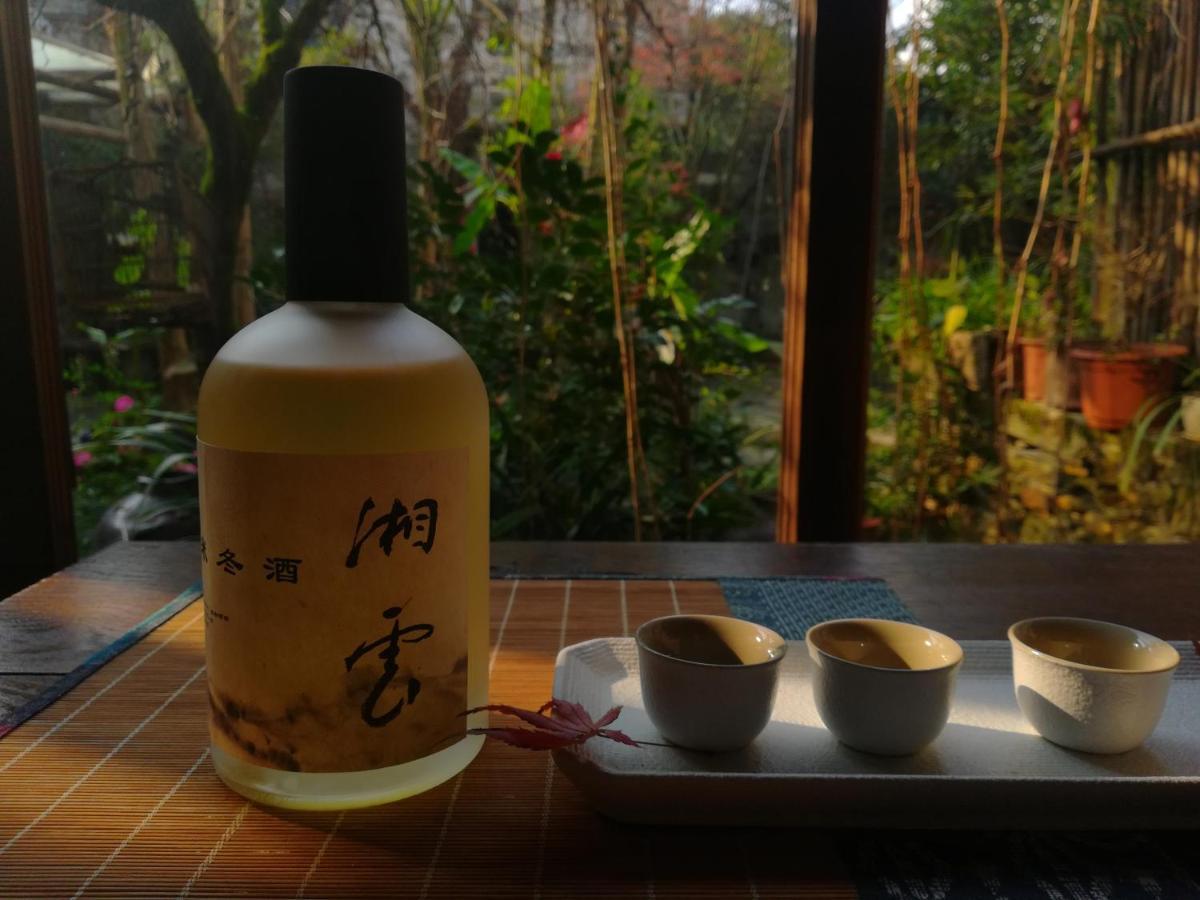 WuYuan QiYe YanXiang Guesthouse Bagian luar foto