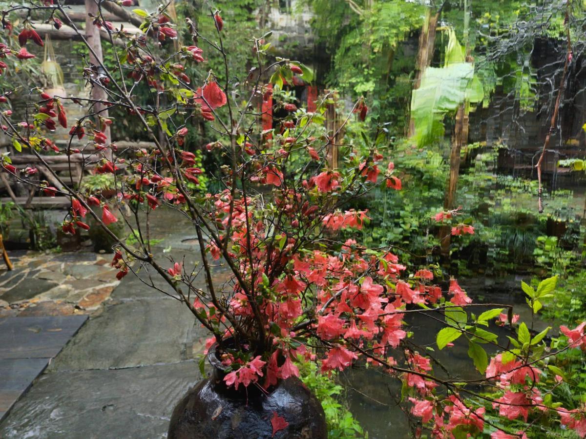 WuYuan QiYe YanXiang Guesthouse Bagian luar foto