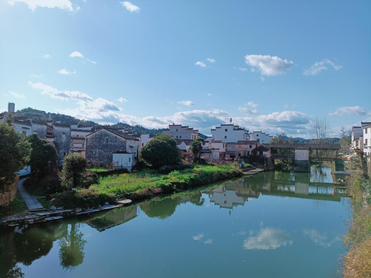 WuYuan QiYe YanXiang Guesthouse Bagian luar foto