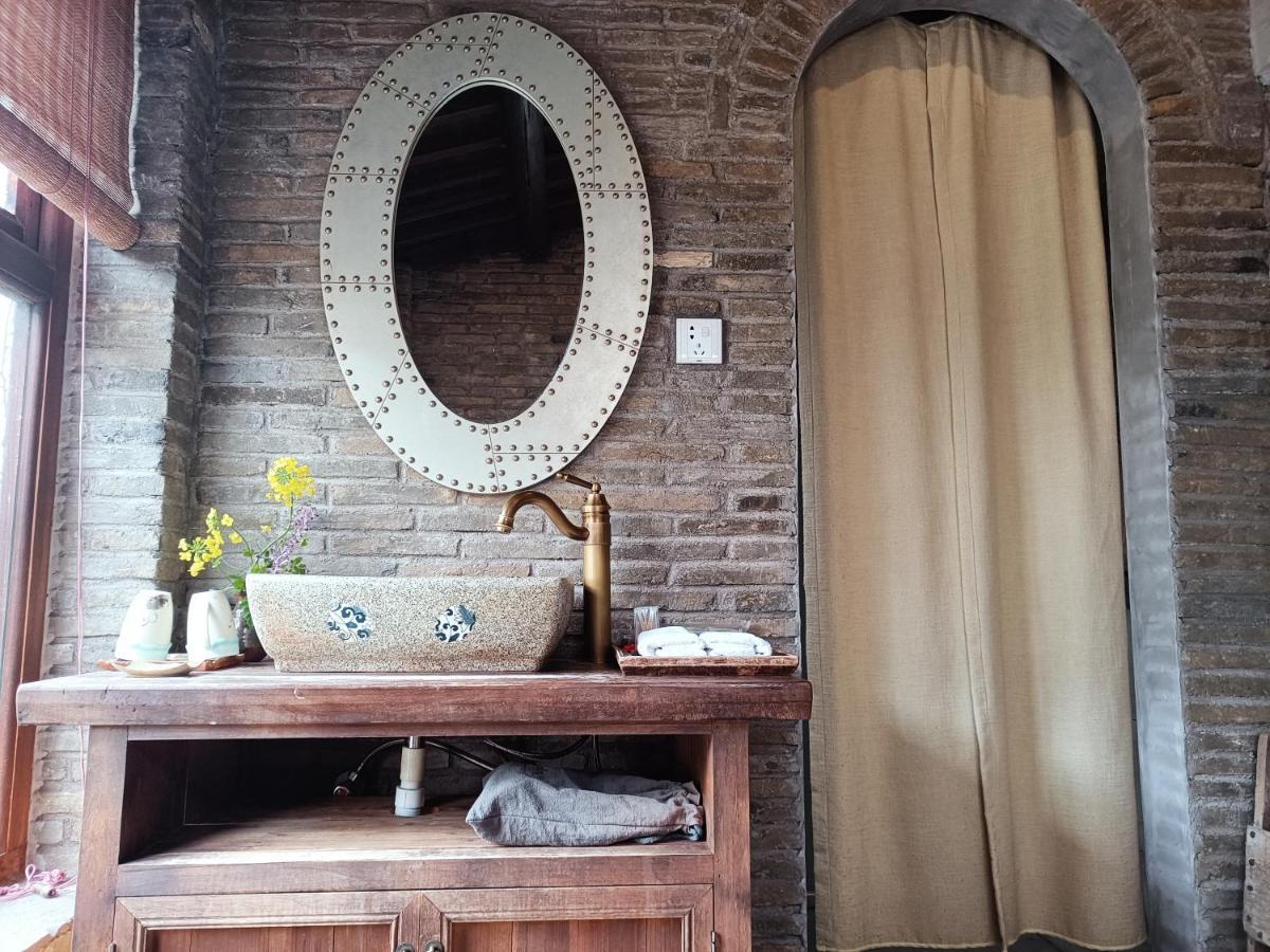 WuYuan QiYe YanXiang Guesthouse Bagian luar foto