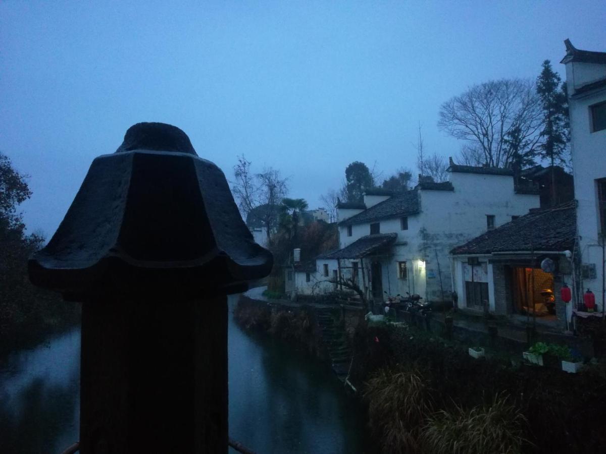 WuYuan QiYe YanXiang Guesthouse Bagian luar foto