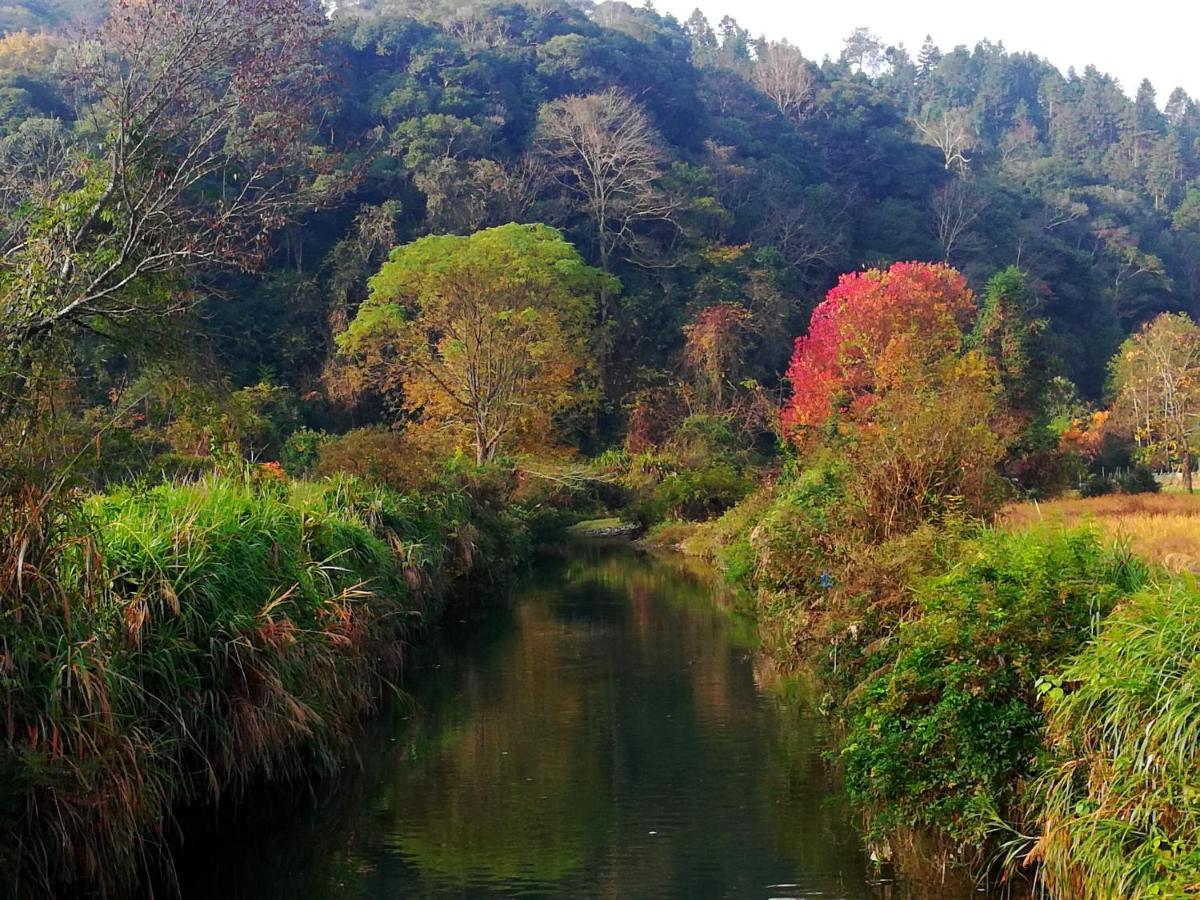 WuYuan QiYe YanXiang Guesthouse Bagian luar foto