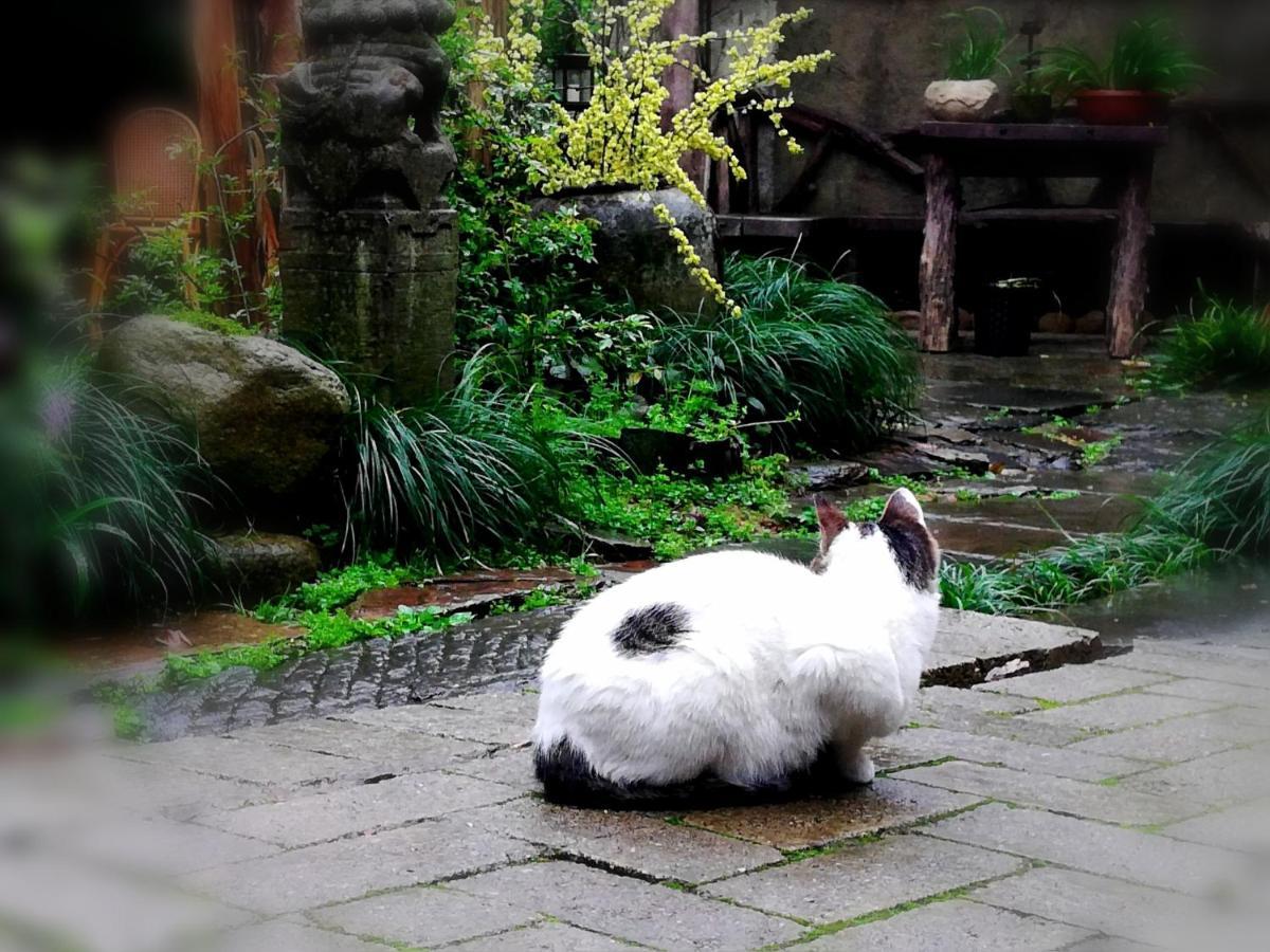 WuYuan QiYe YanXiang Guesthouse Bagian luar foto