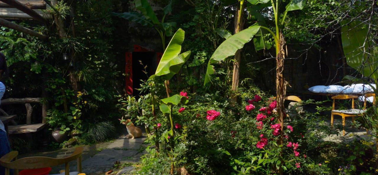 WuYuan QiYe YanXiang Guesthouse Bagian luar foto