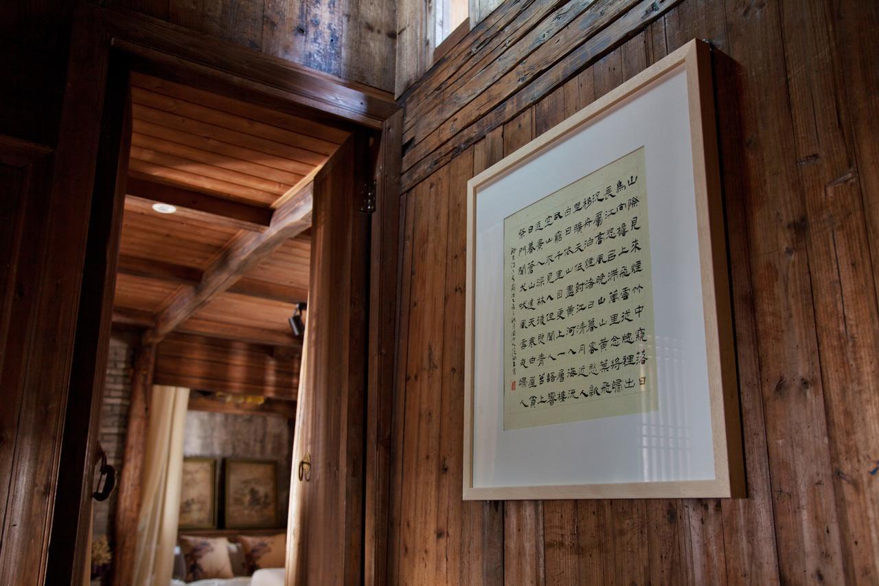 WuYuan QiYe YanXiang Guesthouse Bagian luar foto