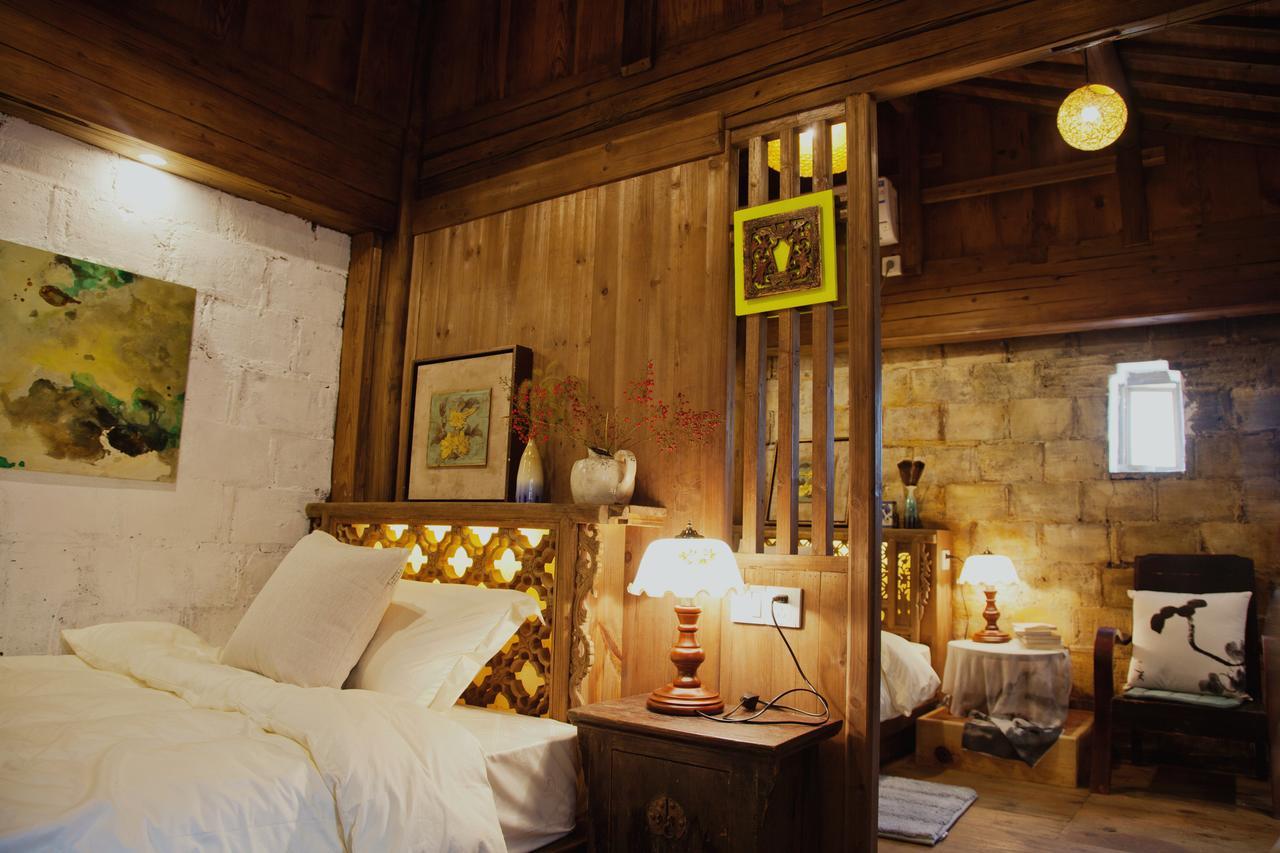 WuYuan QiYe YanXiang Guesthouse Bagian luar foto