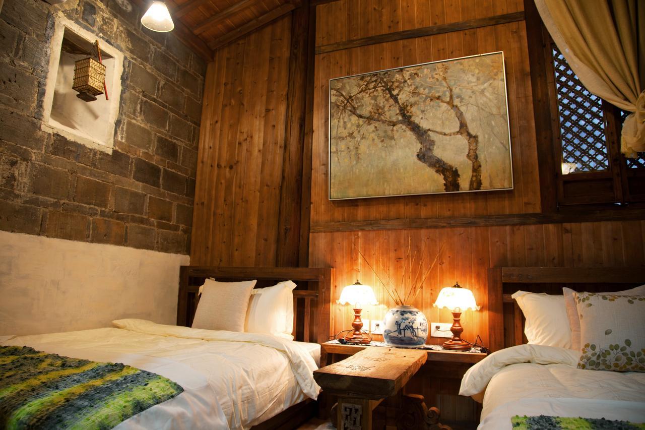 WuYuan QiYe YanXiang Guesthouse Bagian luar foto