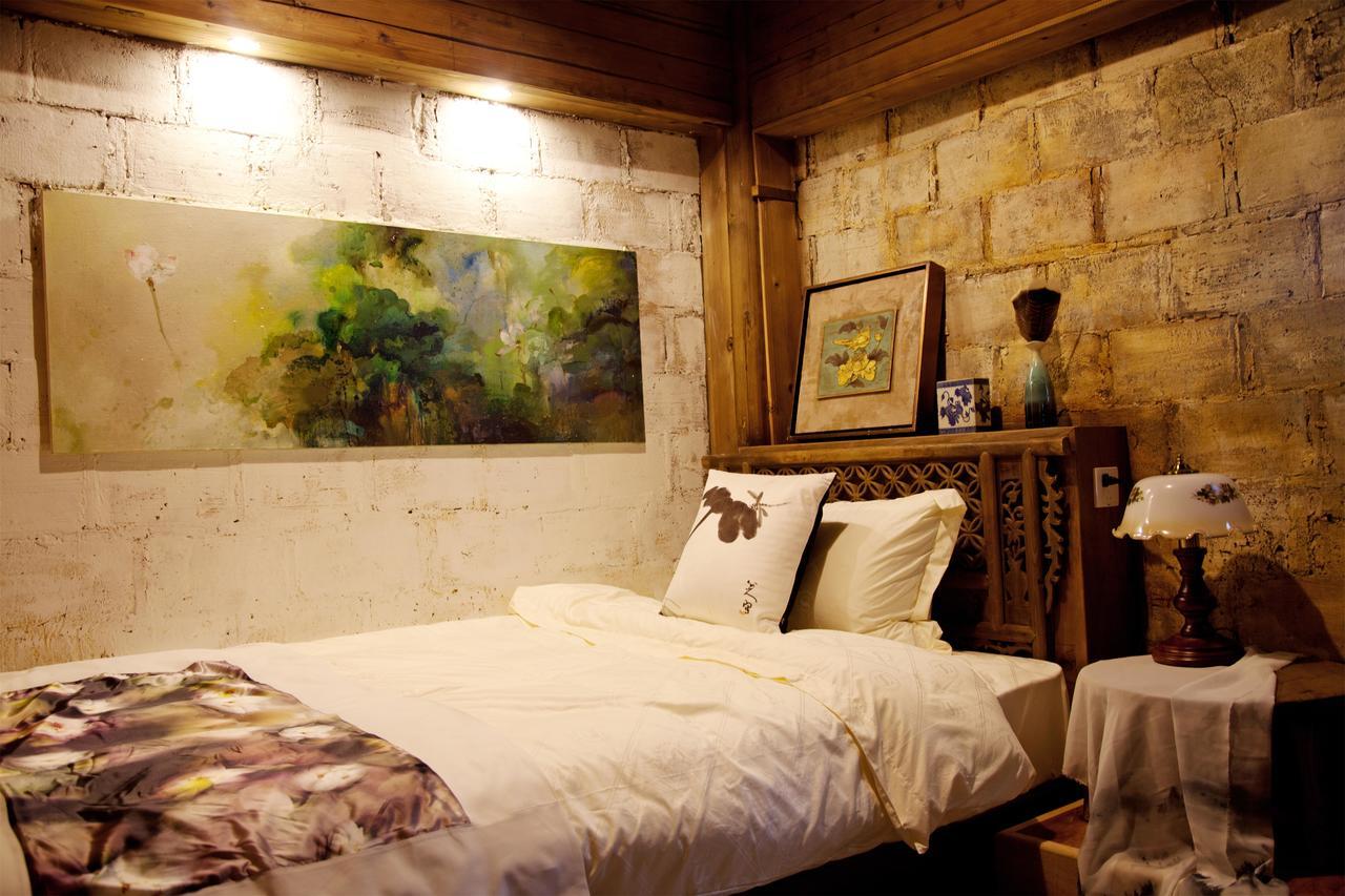 WuYuan QiYe YanXiang Guesthouse Bagian luar foto