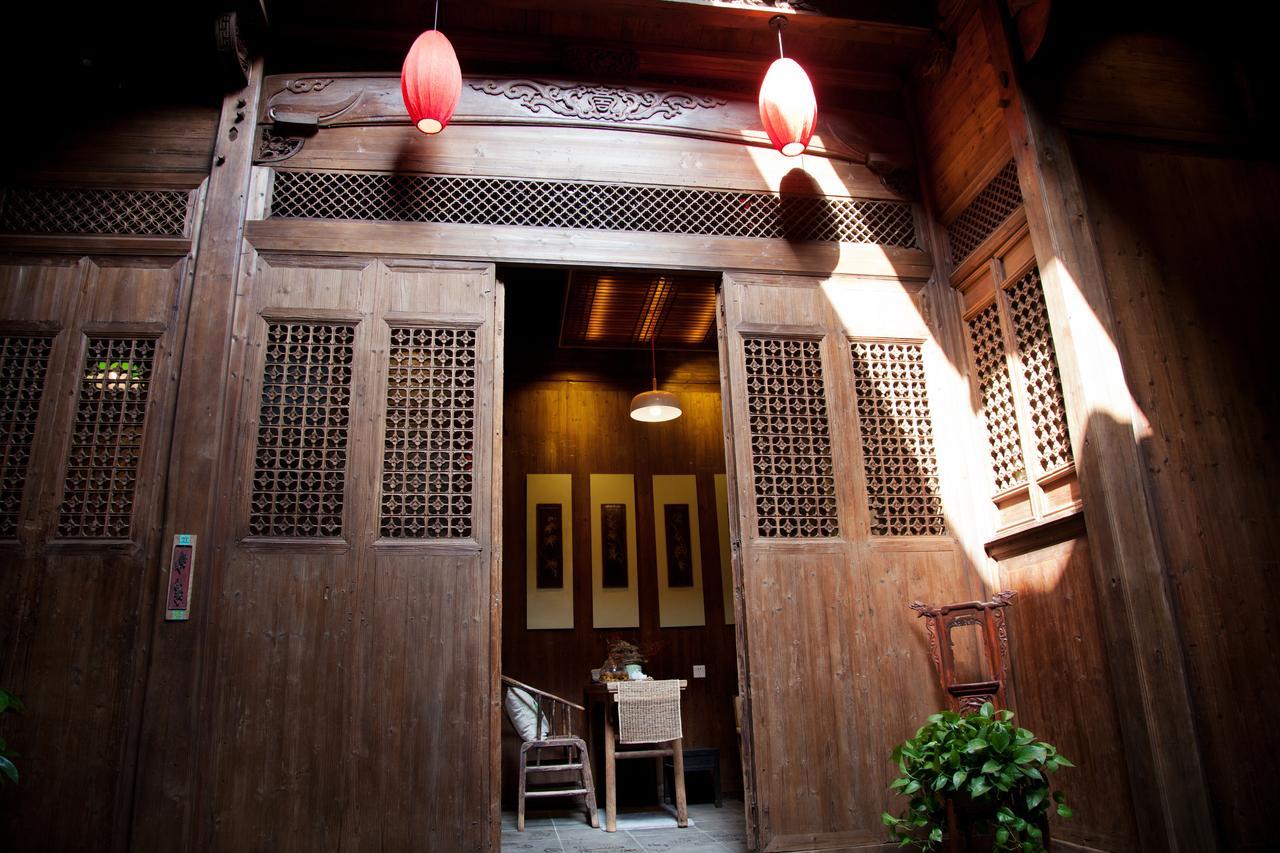 WuYuan QiYe YanXiang Guesthouse Bagian luar foto