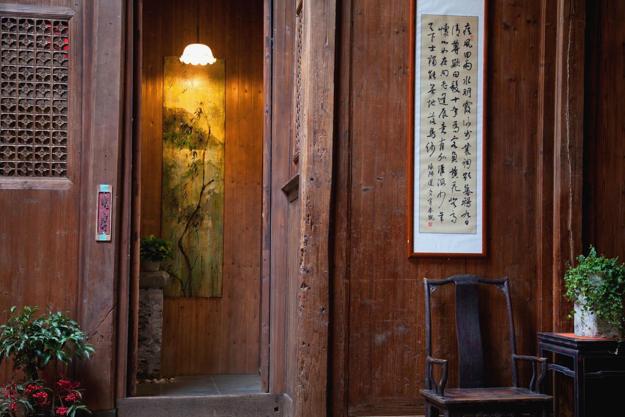 WuYuan QiYe YanXiang Guesthouse Bagian luar foto