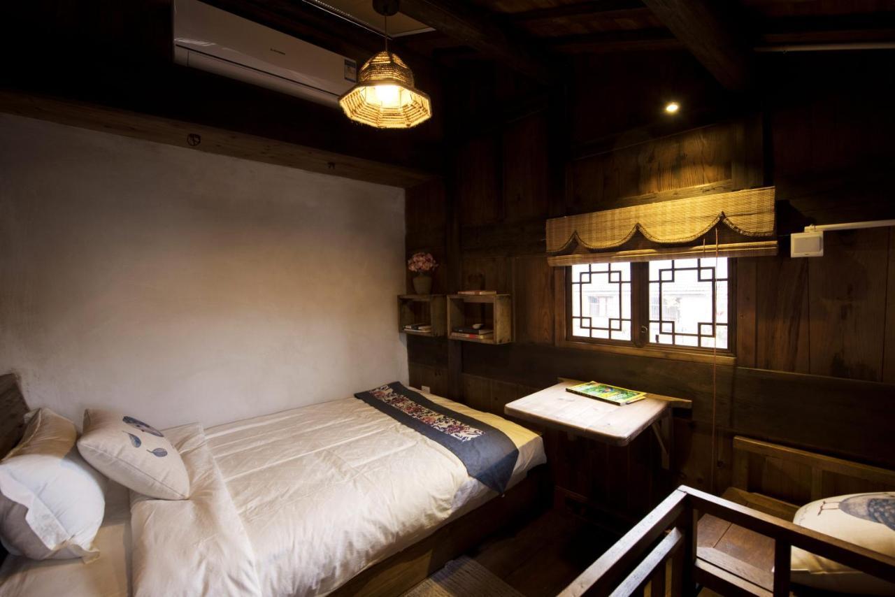 WuYuan QiYe YanXiang Guesthouse Bagian luar foto