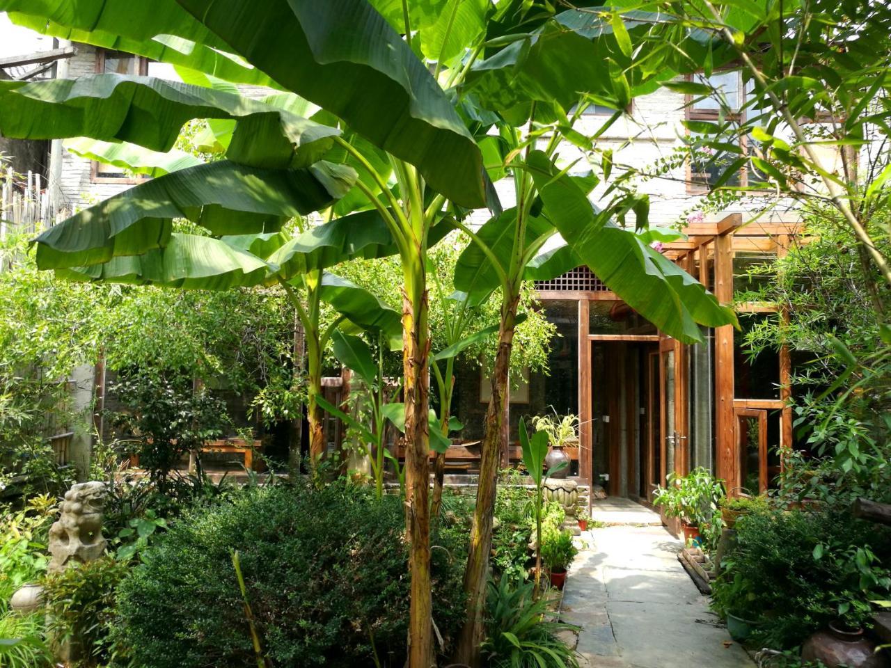 WuYuan QiYe YanXiang Guesthouse Bagian luar foto