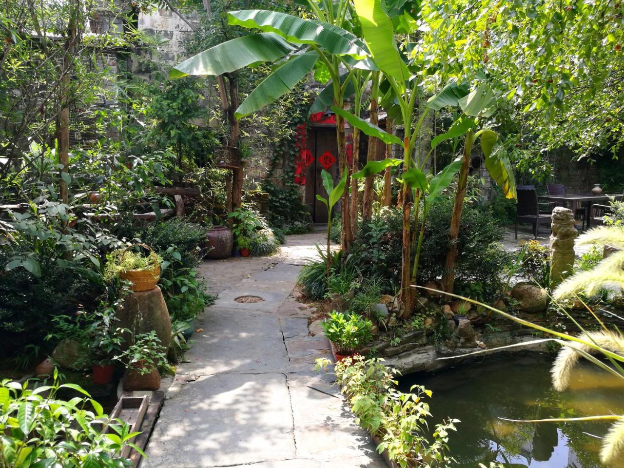 WuYuan QiYe YanXiang Guesthouse Bagian luar foto