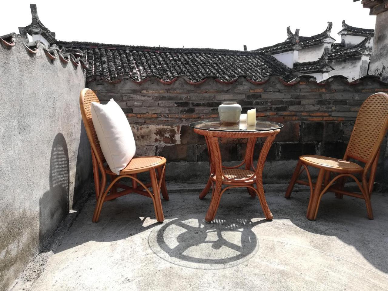 WuYuan QiYe YanXiang Guesthouse Bagian luar foto