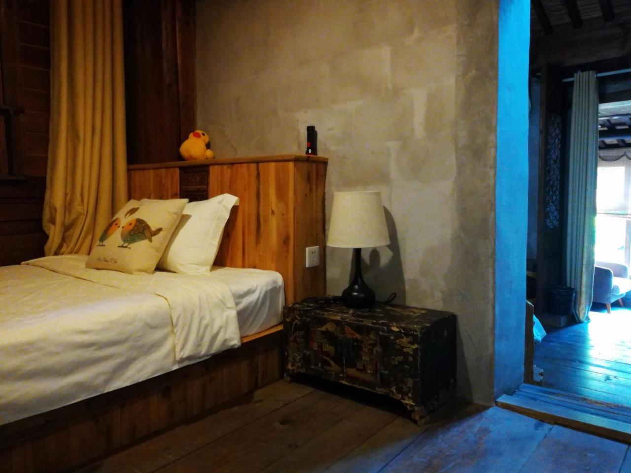 WuYuan QiYe YanXiang Guesthouse Bagian luar foto